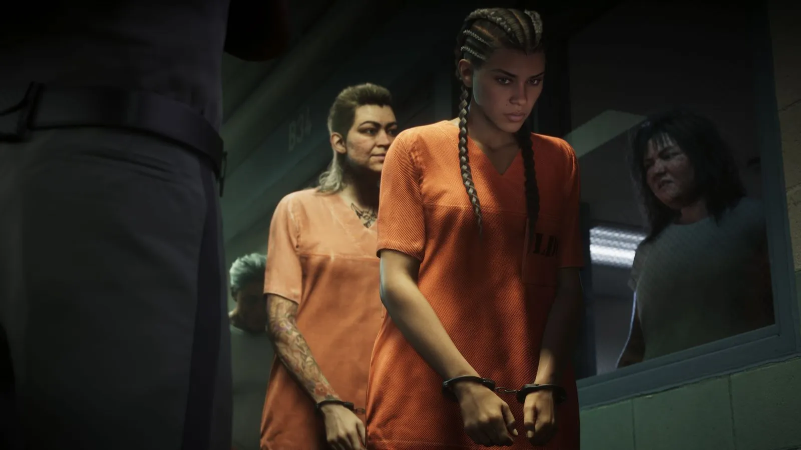 Lucia Caminos in an orange prison jumpsuit and tight double French braids, handcuffed inside Leonida Penitentiary