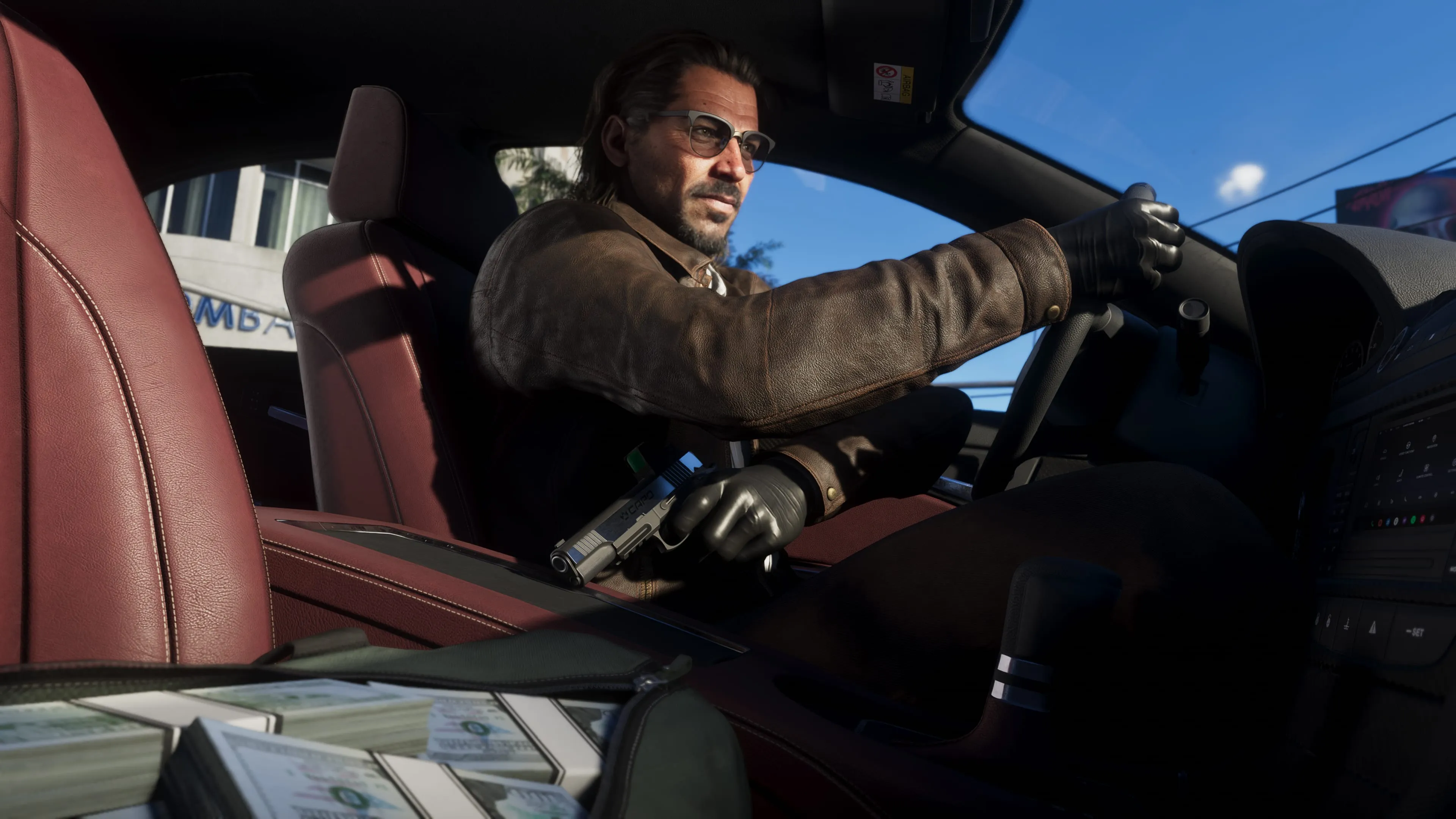 Raul Bautista at the wheel of a car with stacks of cash on the seat beside him in GTA 6